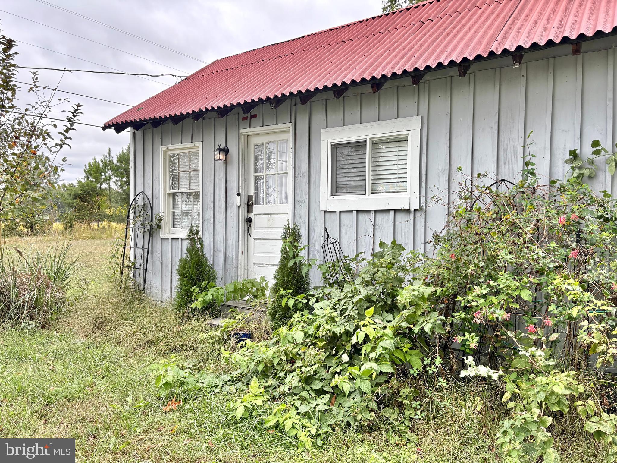 10105 Morgantown Road Newburg, MD 20664 - Photo 11 of 15 a front view of a house with a yard