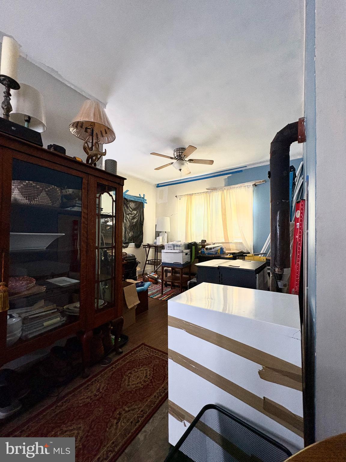 10105 Morgantown Road Newburg, MD 20664 - Photo 10 of 15 a living room with furniture a flat screen tv and a fireplace