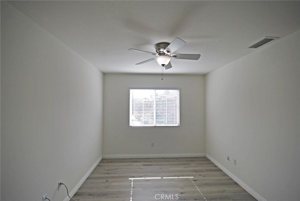 25745 Perlman Place, Unit A Stevenson Ranch, CA 91381 - Photo 17 of 28 an empty room with a window