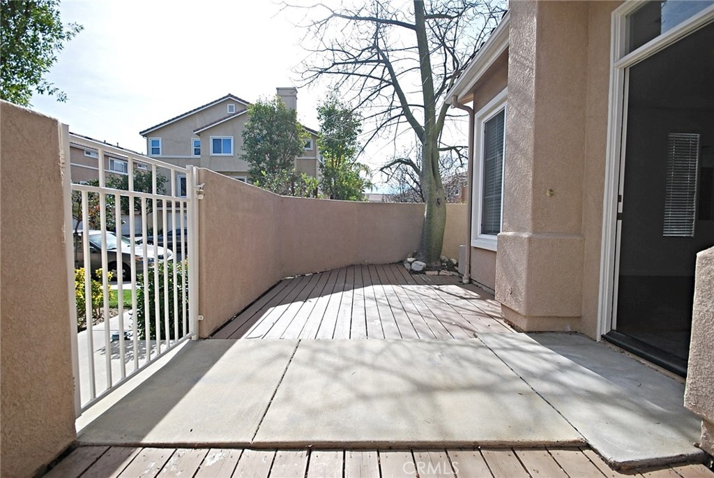 25745 Perlman Place, Unit A Stevenson Ranch, CA 91381 - Photo 2 of 28 a view of backyard with a patio