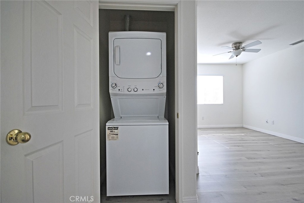 25745 Perlman Place, Unit A Stevenson Ranch, CA 91381 - Photo 23 of 28 a utility room with dryer and washer