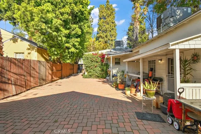 a view of a chairs and tables in patio