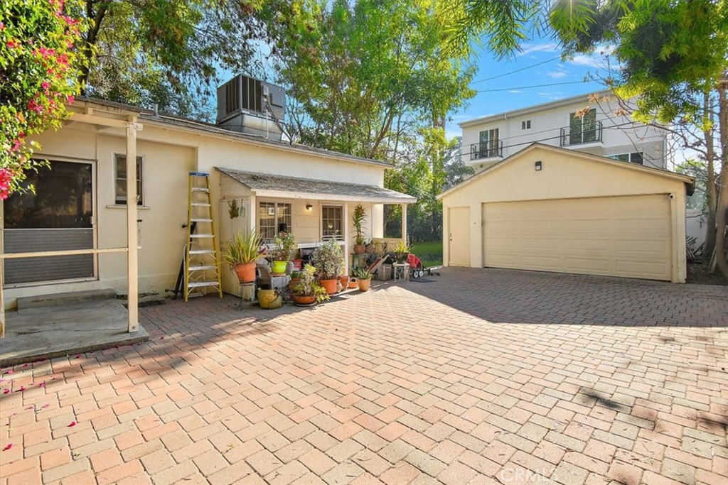 14248 Friar Street Van Nuys, CA 91401 - Photo 30 of 36 a view of a white house