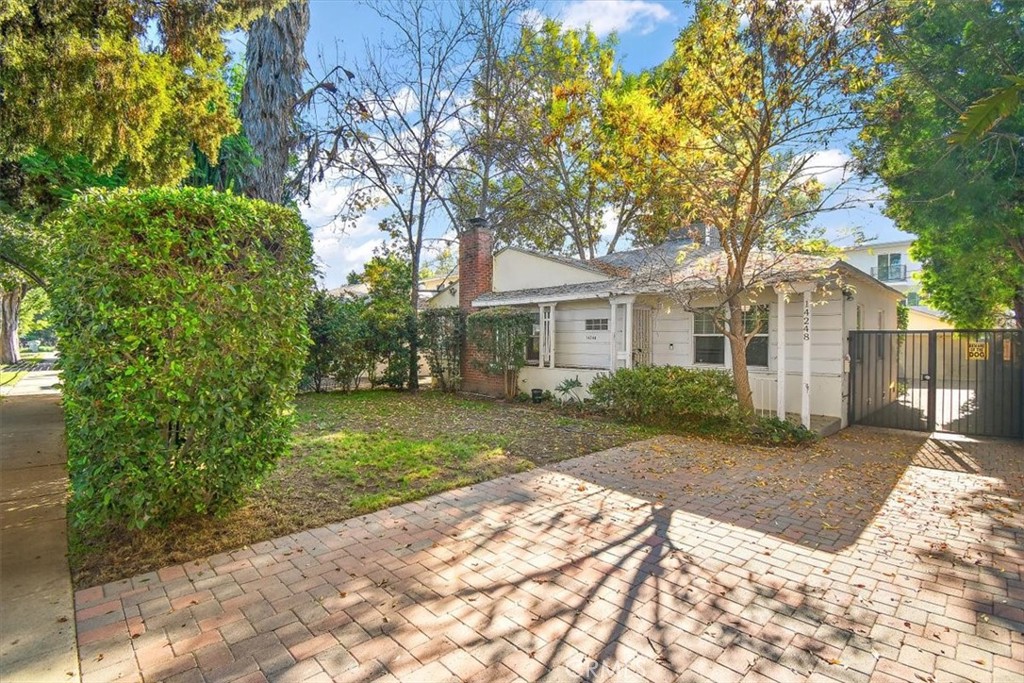 14248 Friar Street Van Nuys, CA 91401 - Photo 3 of 36 a view of a front of a house with a yard