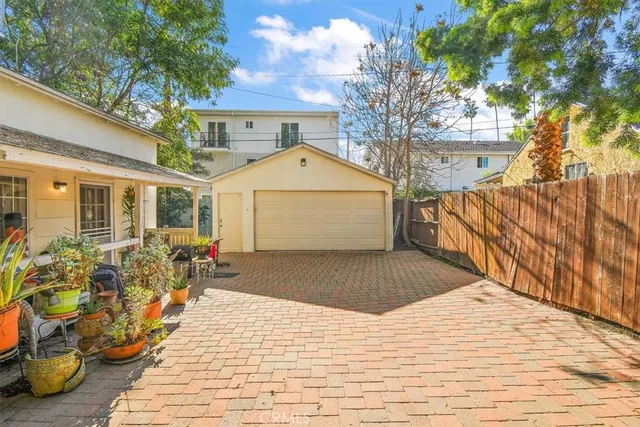 a front view of a house with outdoor space