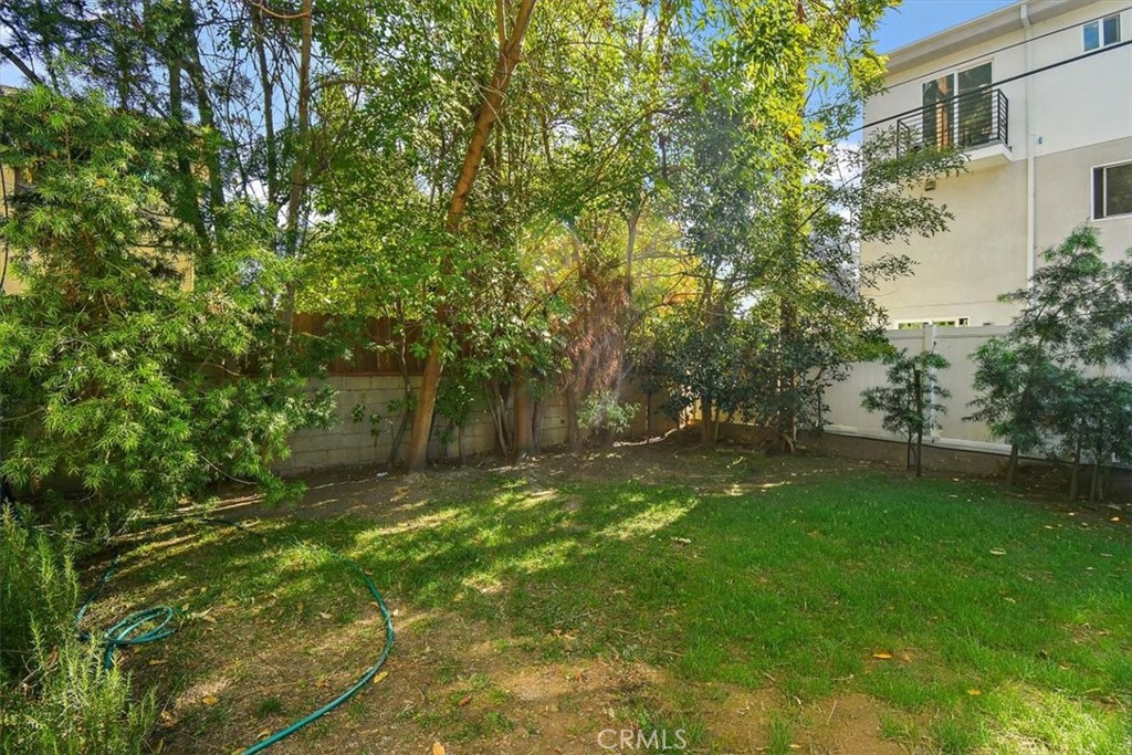 14248 Friar Street Van Nuys, CA 91401 - Photo 32 of 36 a view of backyard with green space