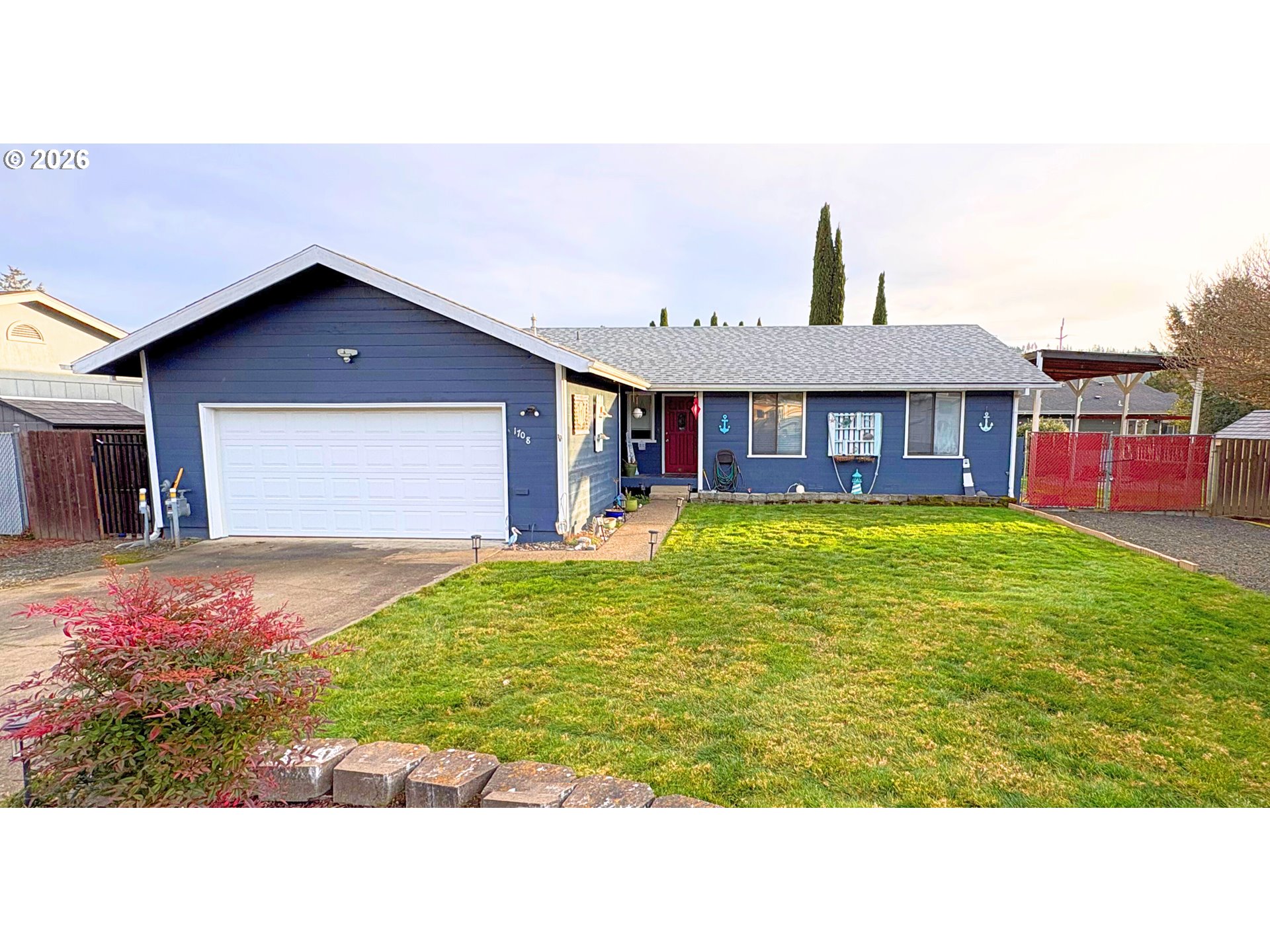 1708 Jasper Avenue Sutherlin, OR 97479 - Photo 1 of 30 a front view of a house with a yard