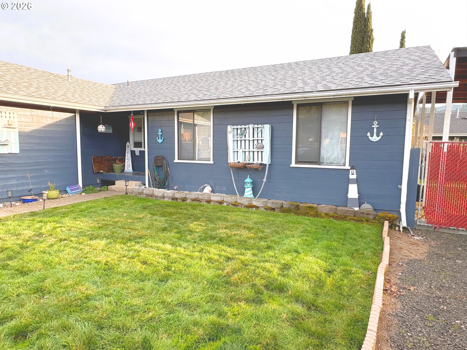 1708 Jasper Avenue Sutherlin, OR 97479 - Photo 21 of 30 a front view of a house with a yard