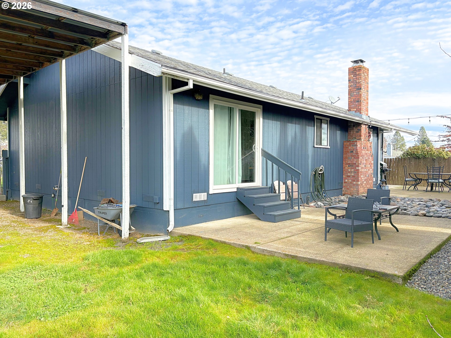 1708 Jasper Avenue Sutherlin, OR 97479 - Photo 26 of 30 a view of a house with backyard porch and sitting area
