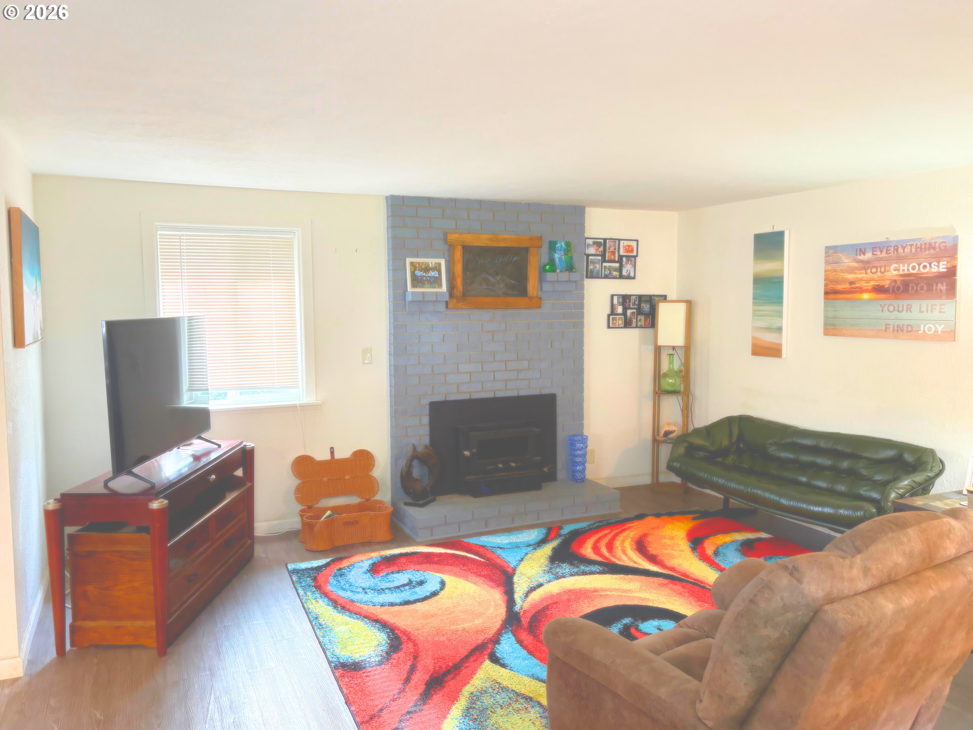 1708 Jasper Avenue Sutherlin, OR 97479 - Photo 9 of 30 a bedroom with a bed and flat screen tv