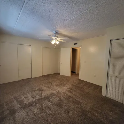 an empty room with a bathroom