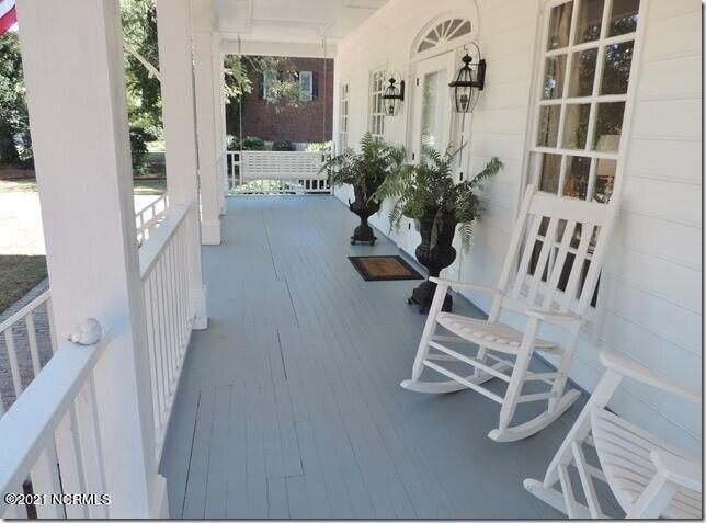 2113 Hermitage Road Northwest Wilson, NC 27896 - Photo 4 of 42 3 Porch w_Room for Rocking Chairs