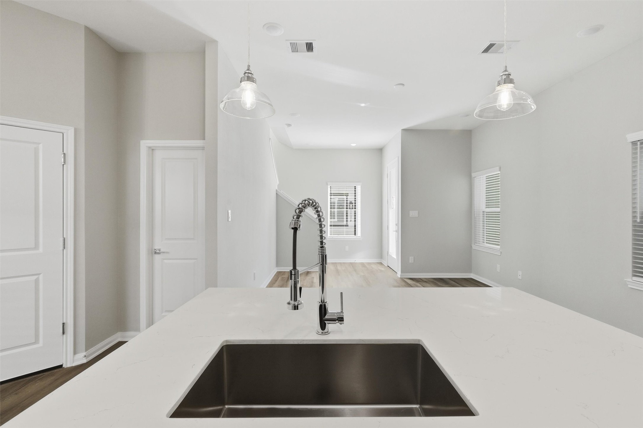 9912 Clark Road, Unit B Houston, TX 77076 - Photo 15 of 48 a kitchen with a sink and a mirror