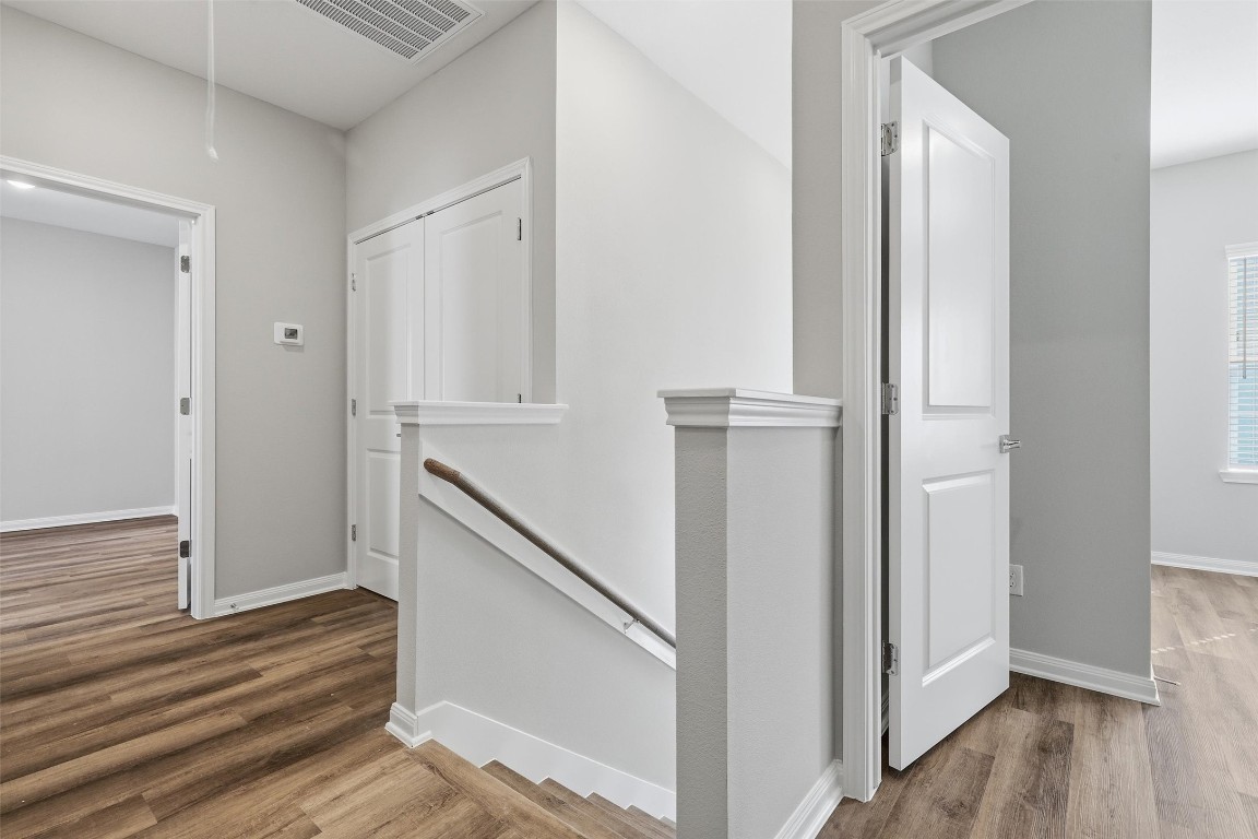 9912 Clark Road, Unit B Houston, TX 77076 - Photo 22 of 48 a view of entryway with wooden floor
