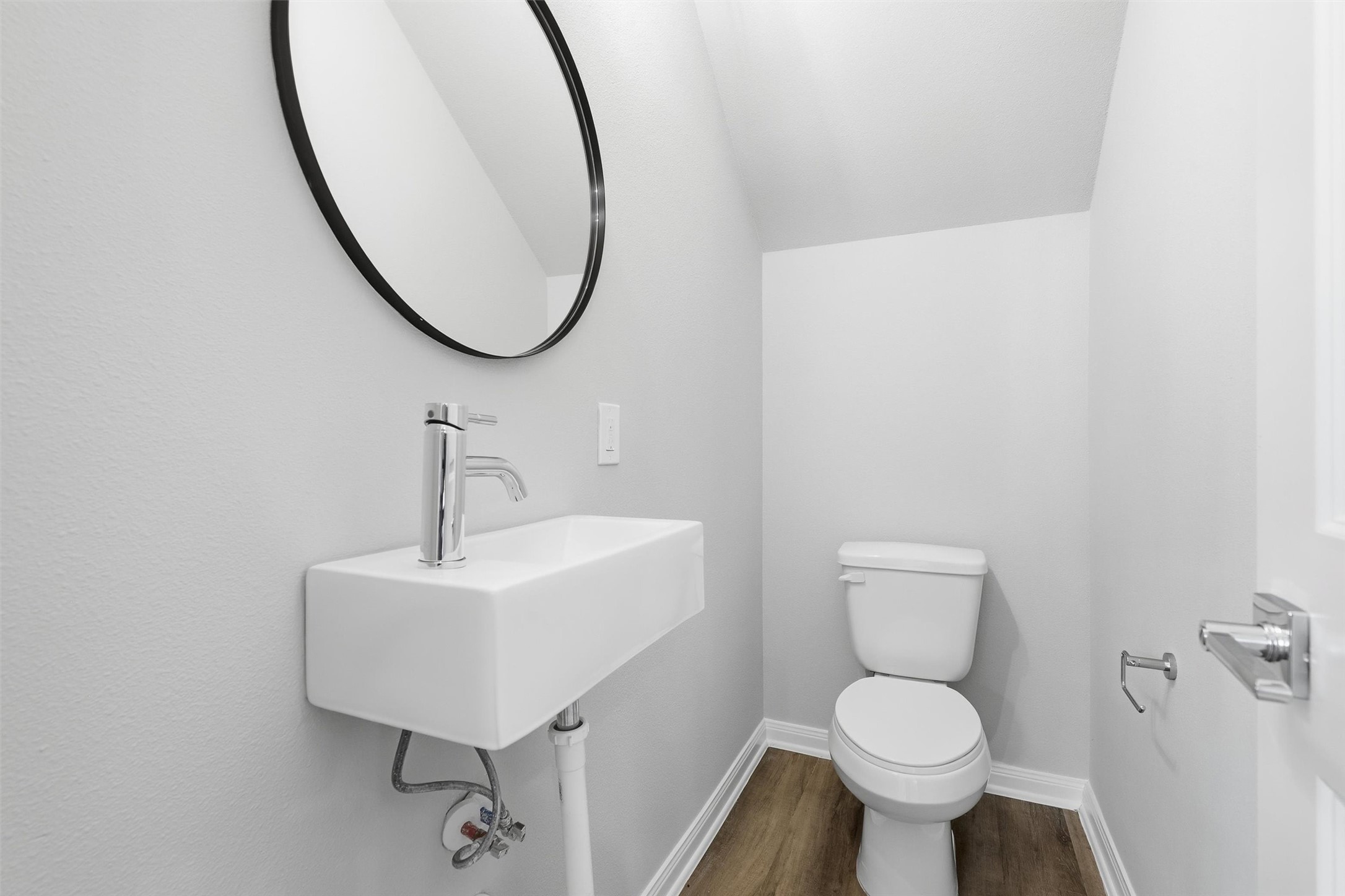 9912 Clark Road, Unit B Houston, TX 77076 - Photo 46 of 48 a bathroom with a sink toilet and a mirror