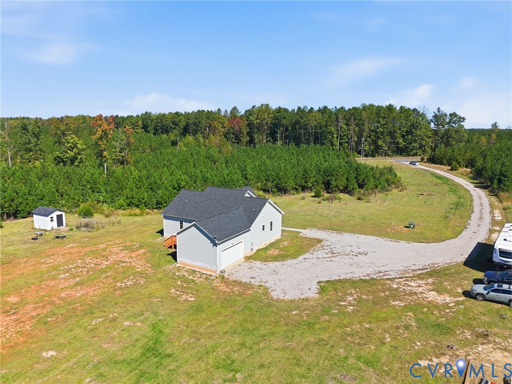 115 Jenkins Church Road Cumberland, VA 23040 - Photo 26 of 28 Grey siding residence with an attached garage, fea