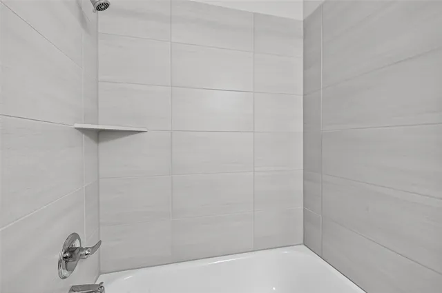 a bathroom with a sink vanity and a mirror