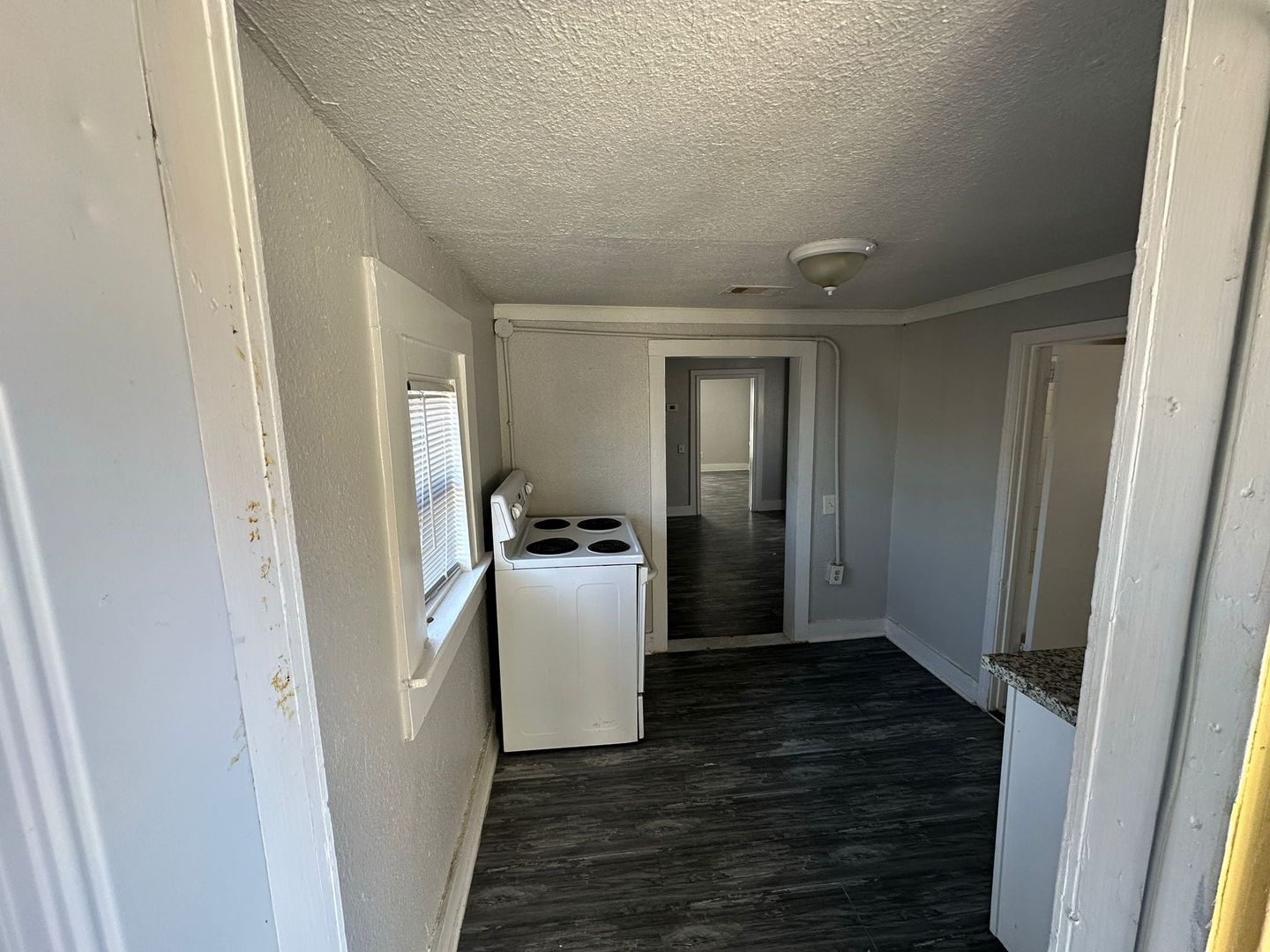412 North 8th Street, Unit 1 Pasadena, TX 77502 - Photo 6 of 17 a view of a storage & utility room with a fridge
