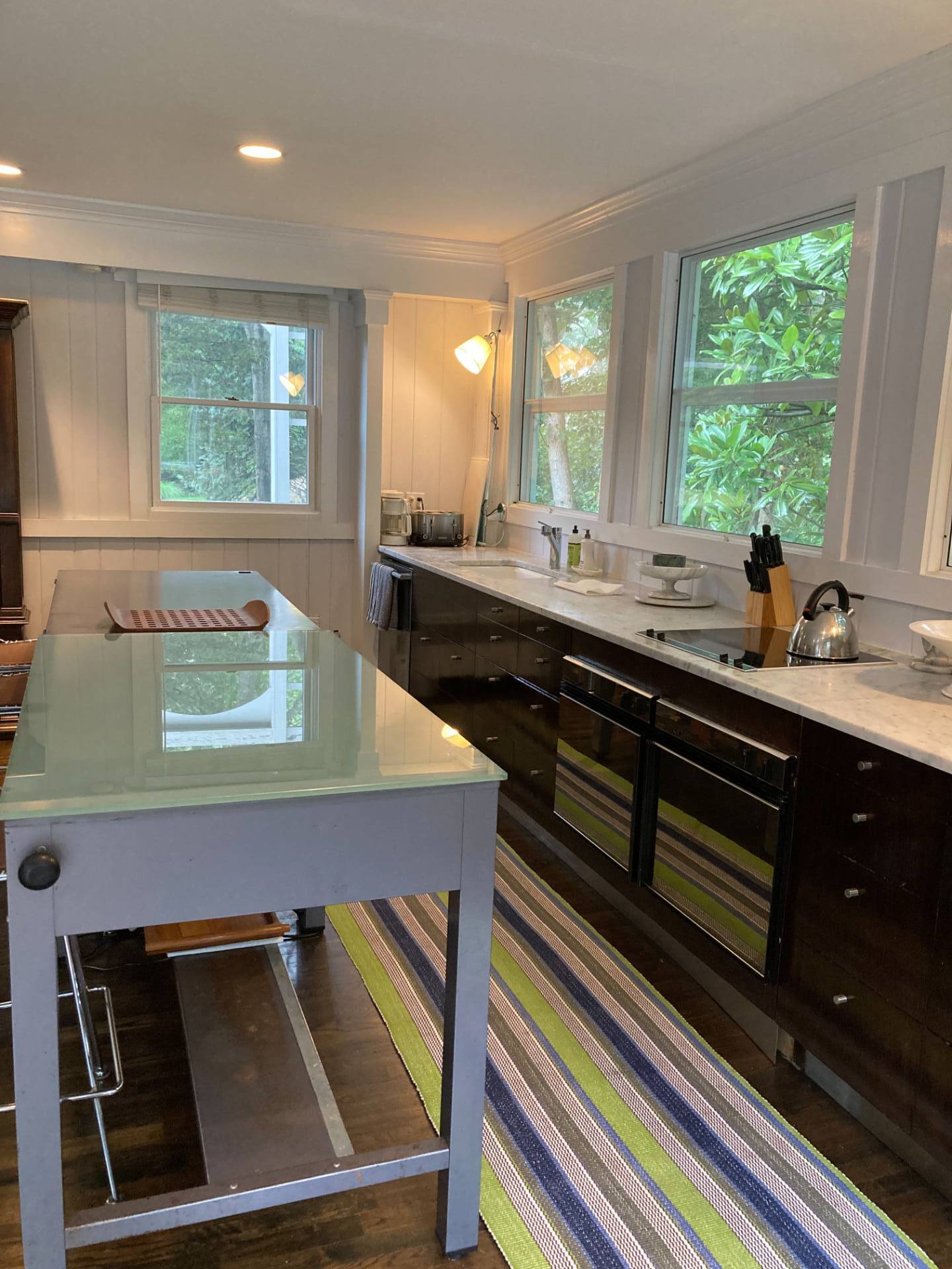 311 Meadows West Bridgehampton, NY 11932 - Photo 10 of 11 a kitchen with a sink appliances and a window