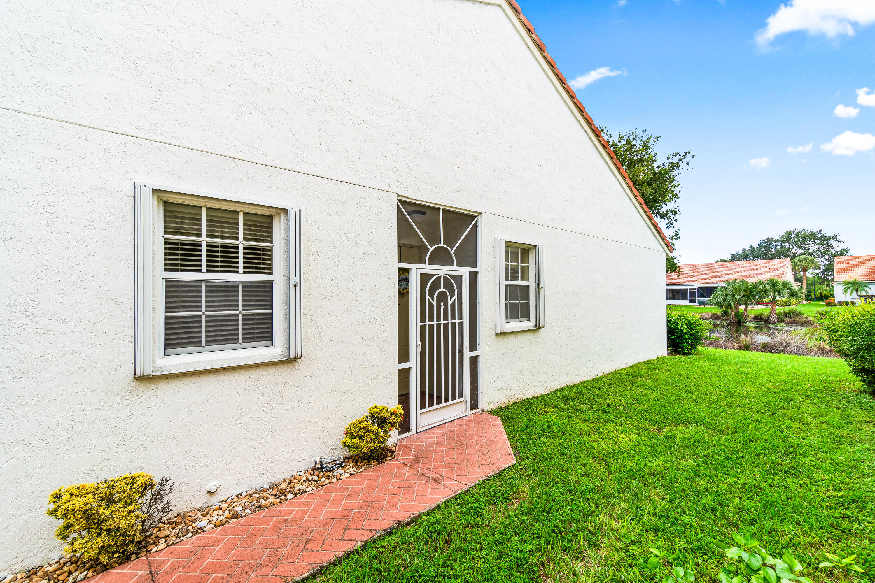 6252 Heliconia Road Delray Beach, FL 33484 - Photo 3 of 38 Front Walkway