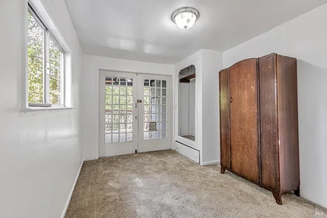 an empty room with windows