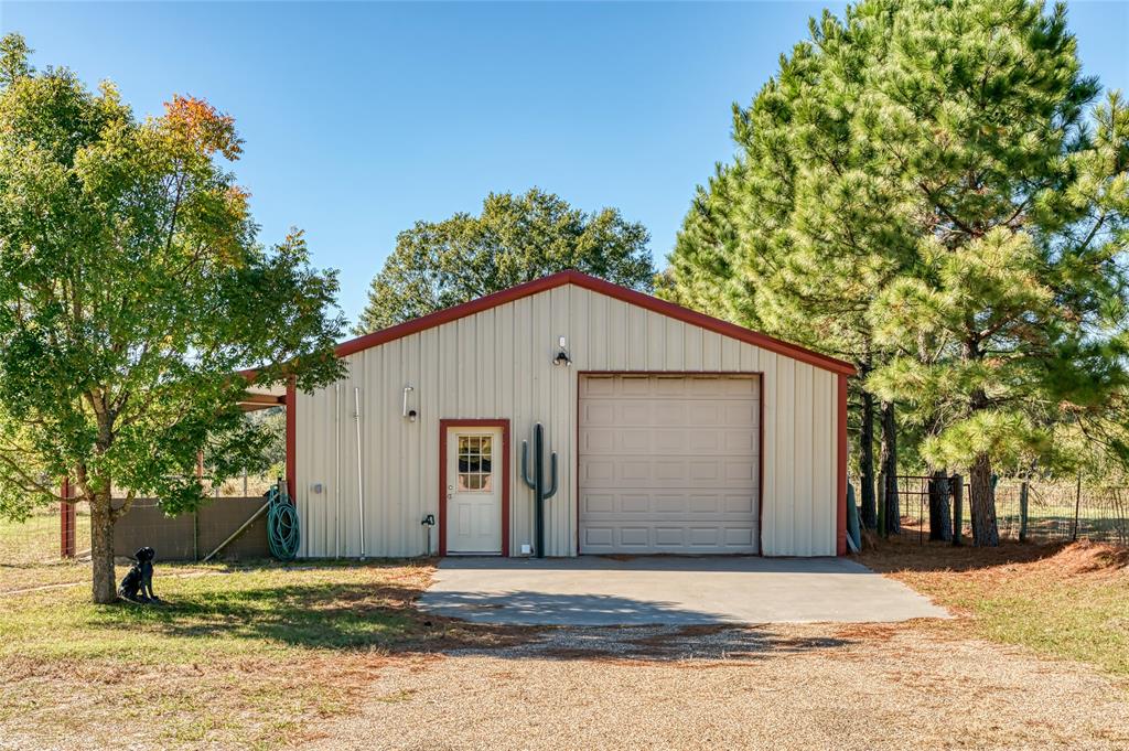 2261 Highway 276 Emory, TX 75440 - Photo 24 of 35 a view of tree in front of a house with large tree