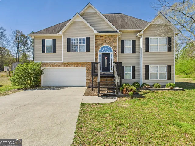 a front view of house with yard