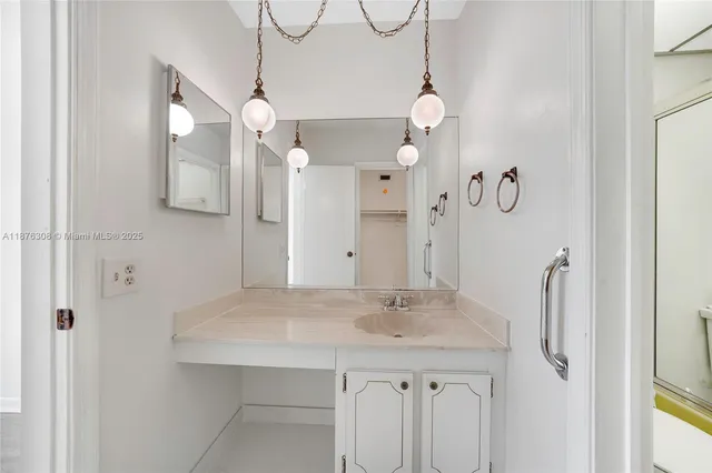 a bathroom with a shower and a toilet