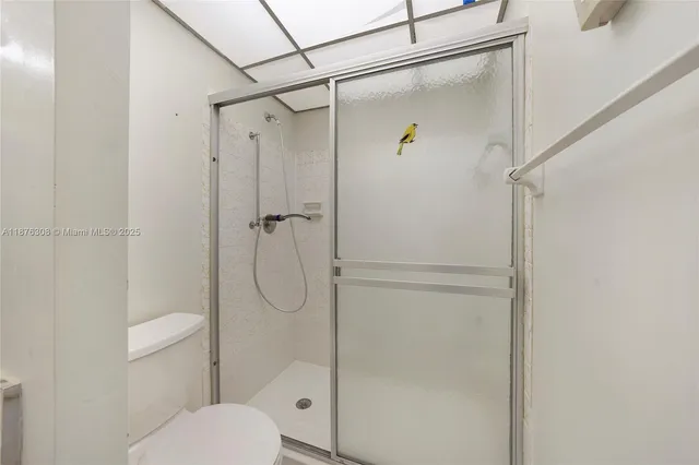 a view of small space with wooden floor