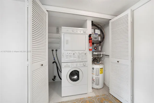 a view of a kitchen with wooden floor and a kitchen
