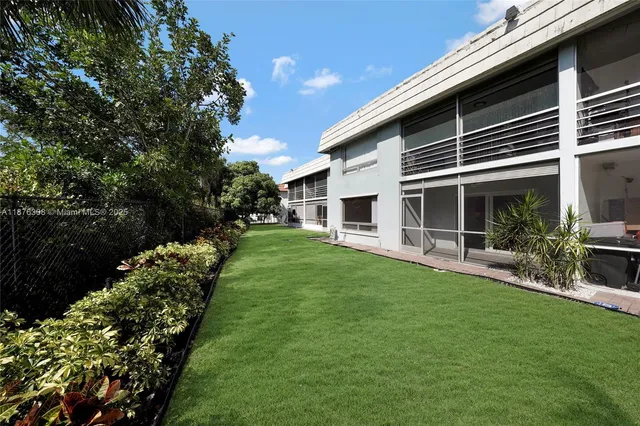 a view of a porch with a yard