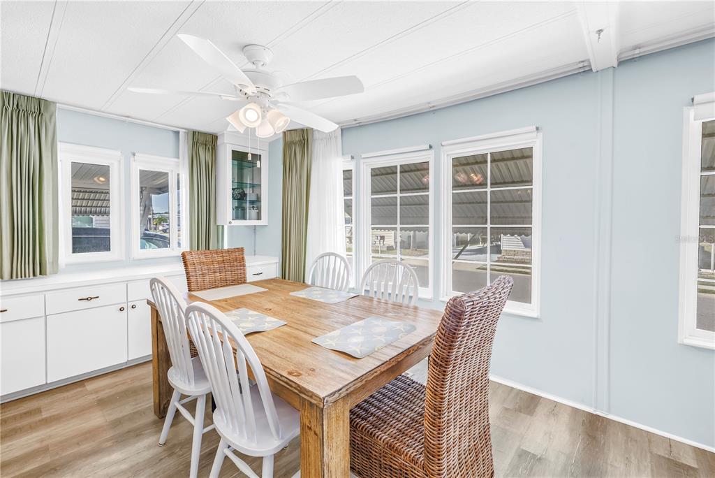 1100 South Belcher Road, Unit 502 Largo, FL 33771 - Photo 7 of 51 a view of a dining room with furniture window and outside view