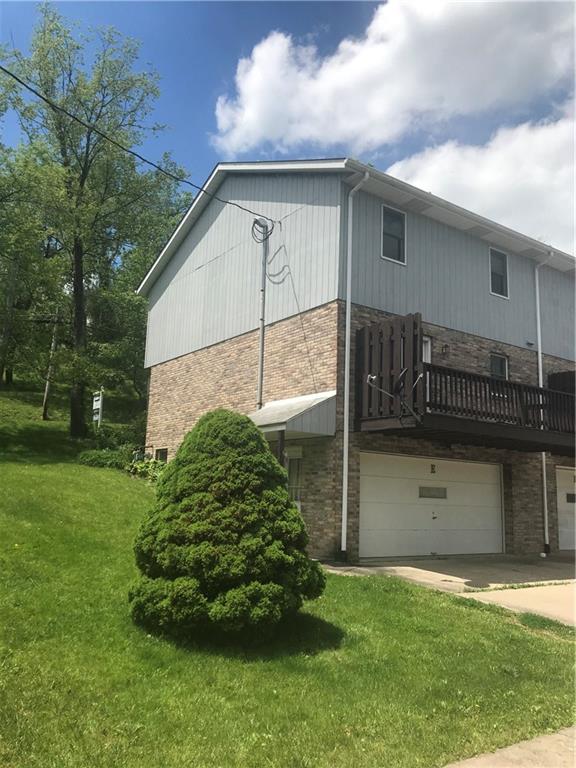 1200 McGovern Road, Unit E Houston, PA 15342 - Photo 16 of 16 2 car garage, side yard, no HOA fees. Enjoy the serene peaceful deck off of the Dining room