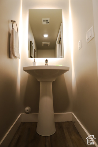 2331 Mesa Road, Unit E3 Moab, UT 84532 - Photo 33 of 71 Bathroom featuring dark wood-style flooring and baseboards