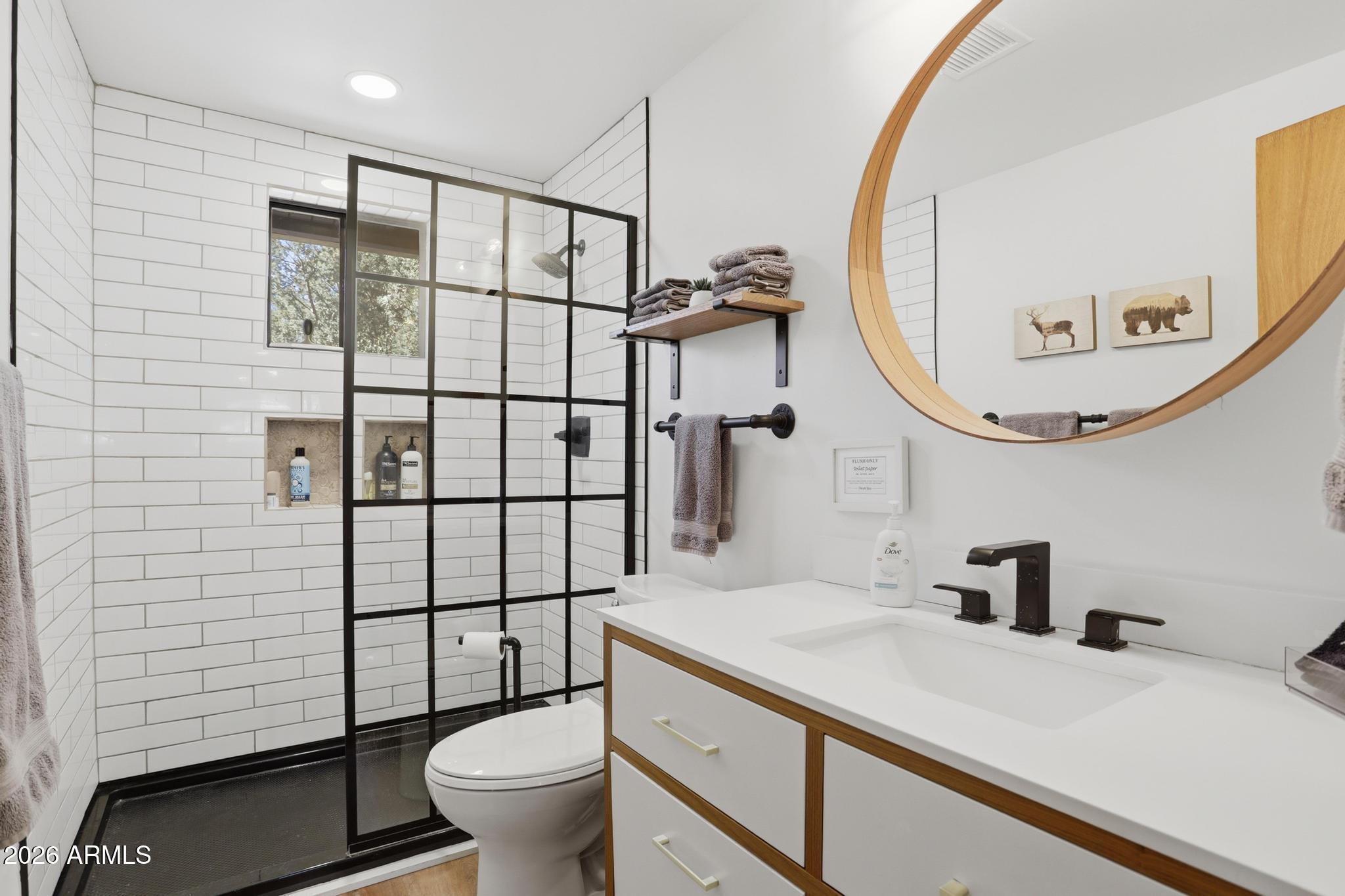 3422 Limestone Way Pine, AZ 85544 - Photo 13 of 35 a bathroom with a sink a toilet and shower