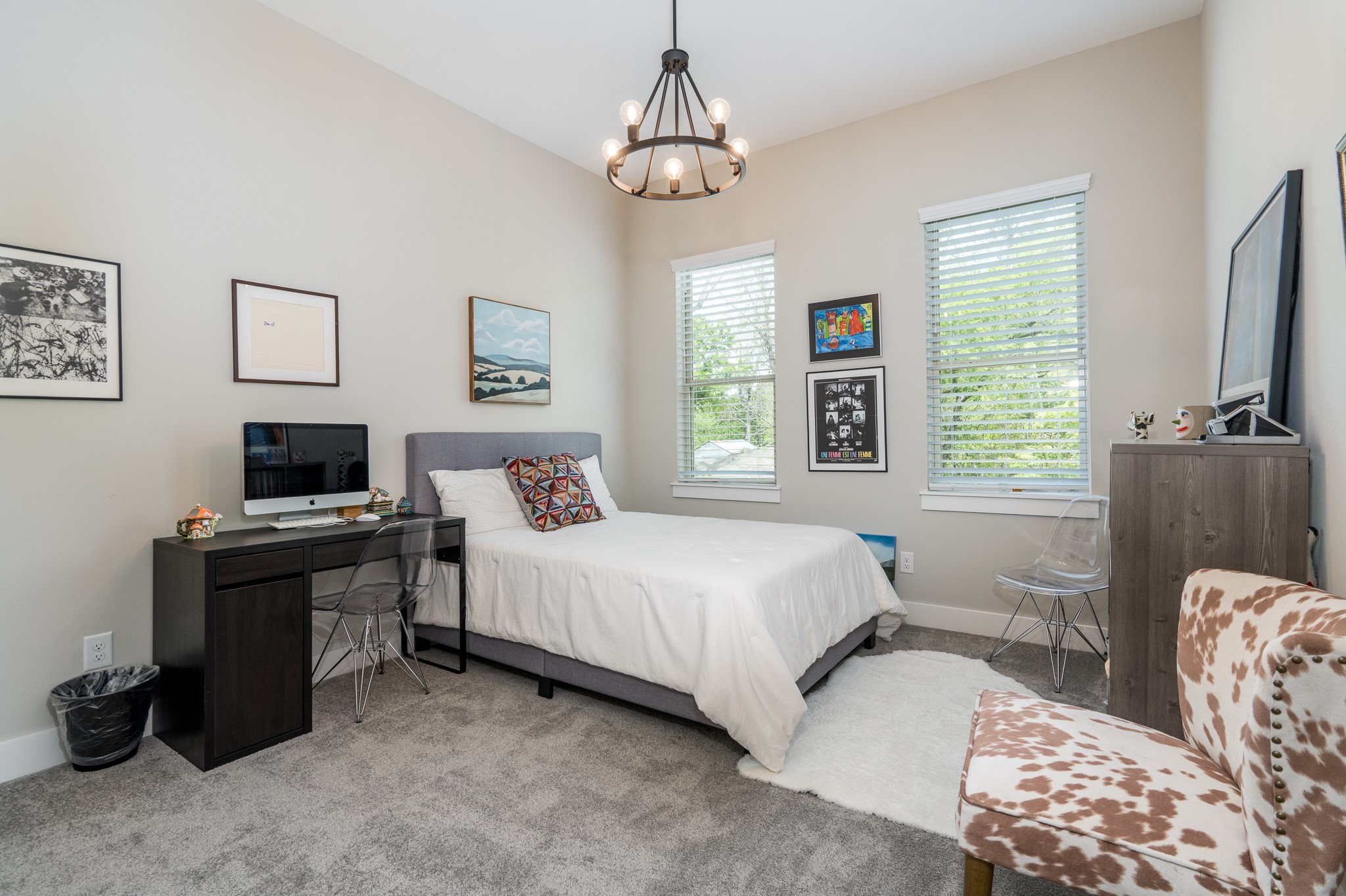 4926 Wunder Way Houston, TX 77069 - Photo 23 of 39 a bedroom with a bed and a flat screen tv
