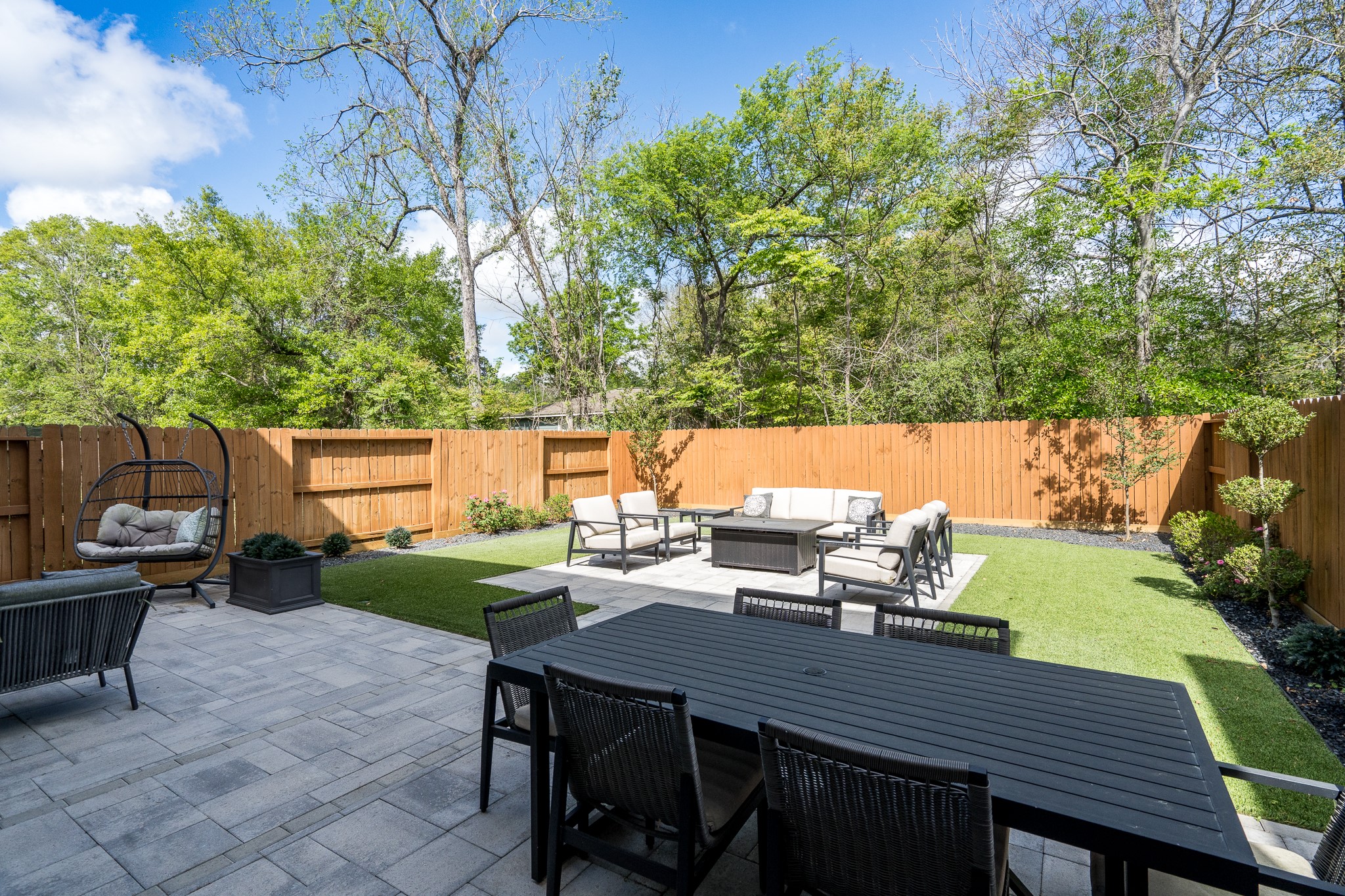 4926 Wunder Way Houston, TX 77069 - Photo 30 of 39 a view of a patio with table and chairs and potted plants