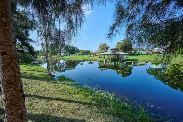 a garden view with a lake view