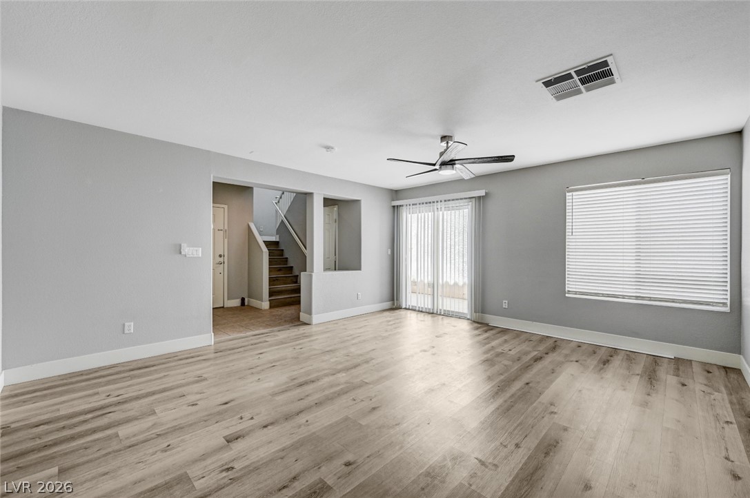 7259 Cestrum Road Las Vegas, NV 89113 - Photo 35 of 35 An inviting open floorplan living area showcases beautiful flooring and abundant natural light.