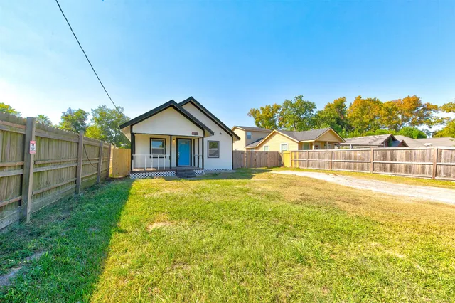 a view of a balcony with wooden floor