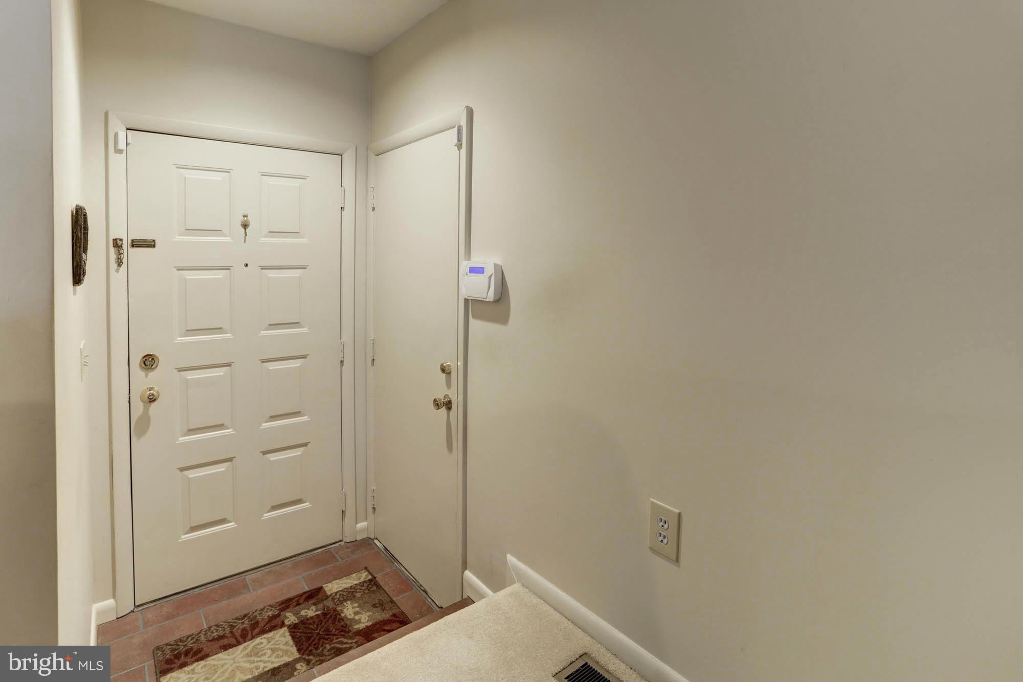 5515 Vantage Point Road Columbia, MD 21044 - Photo 29 of 29 Foyer & Interior Garage Door