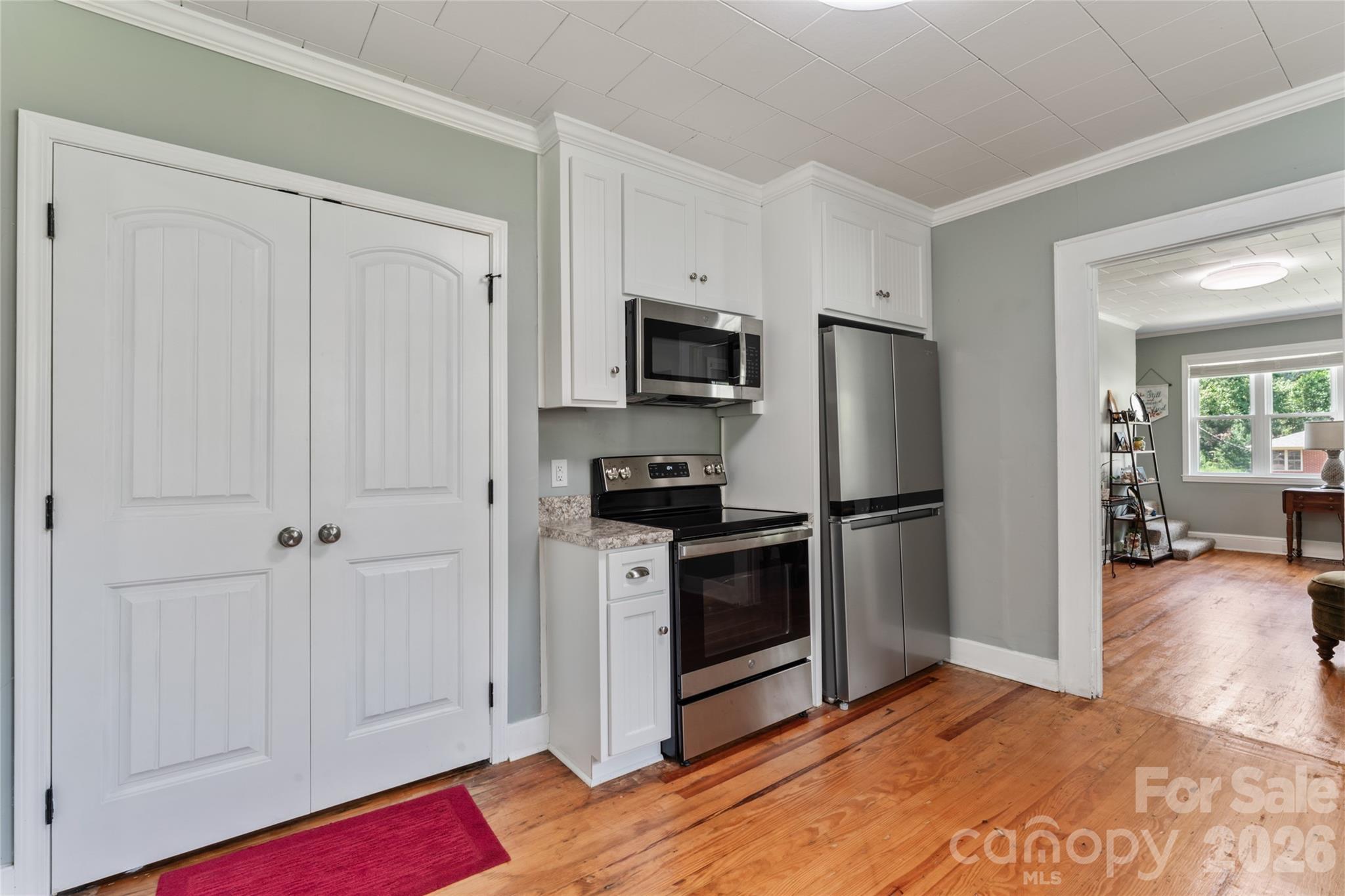 223 Wiley Avenue York, SC 29745 - Photo 11 of 40 a kitchen with a refrigerator and a sink