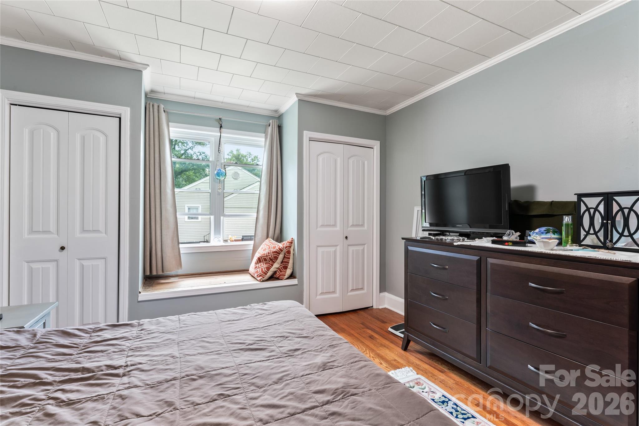 223 Wiley Avenue York, SC 29745 - Photo 18 of 40 a bedroom with a bed and a flat screen tv