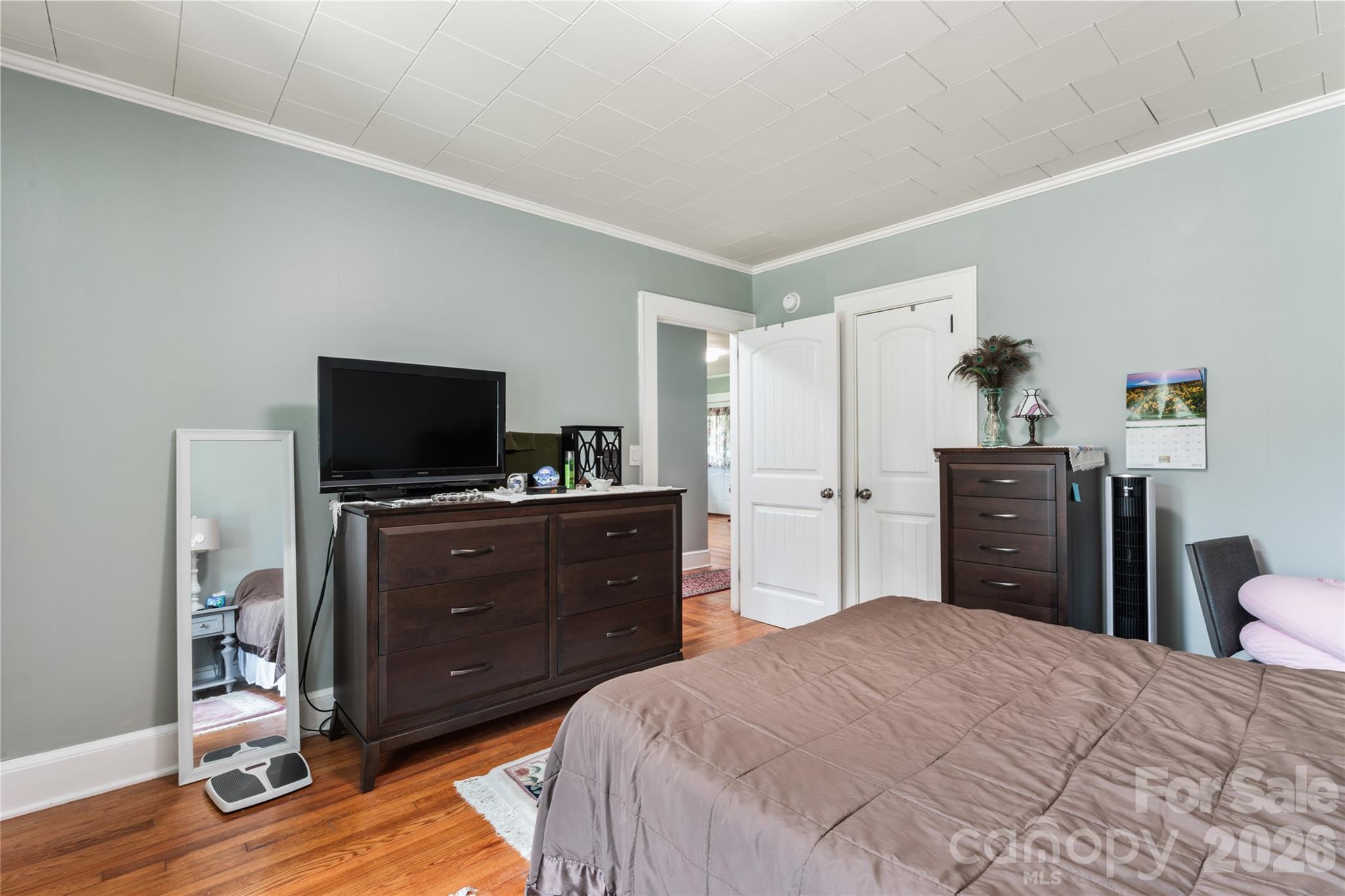 223 Wiley Avenue York, SC 29745 - Photo 19 of 40 a bedroom with a bed and a flat screen tv