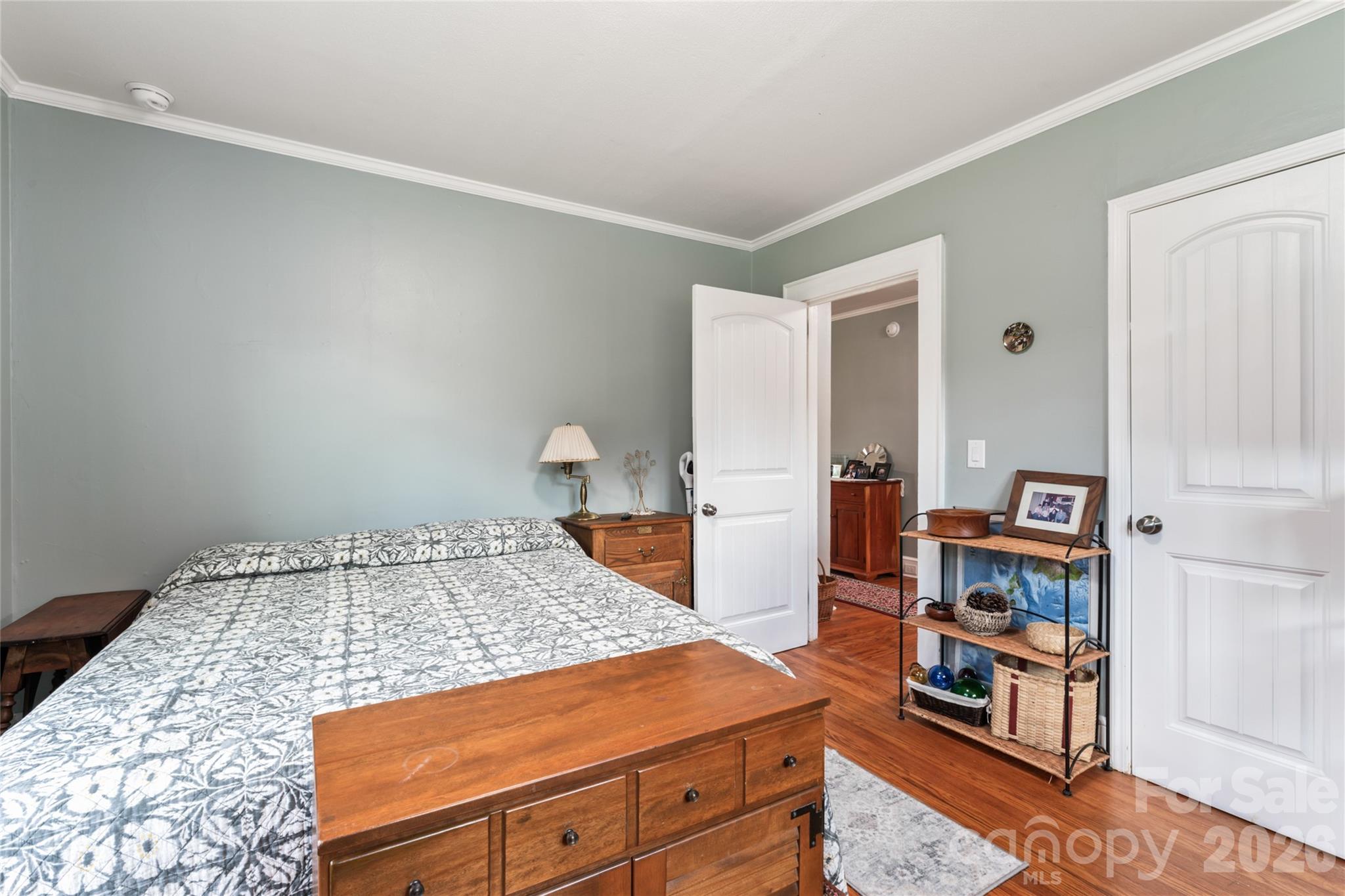 223 Wiley Avenue York, SC 29745 - Photo 22 of 40 a bedroom with a bed and a book shelf