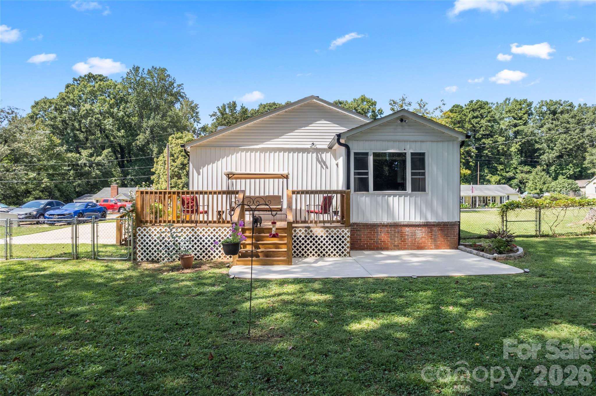 223 Wiley Avenue York, SC 29745 - Photo 28 of 40 a view of a house with a yard and sitting area