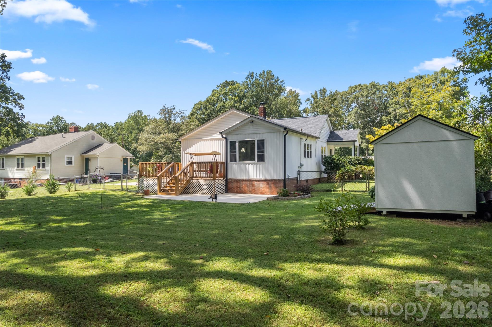 223 Wiley Avenue York, SC 29745 - Photo 29 of 40 a front view of house with yard and green space