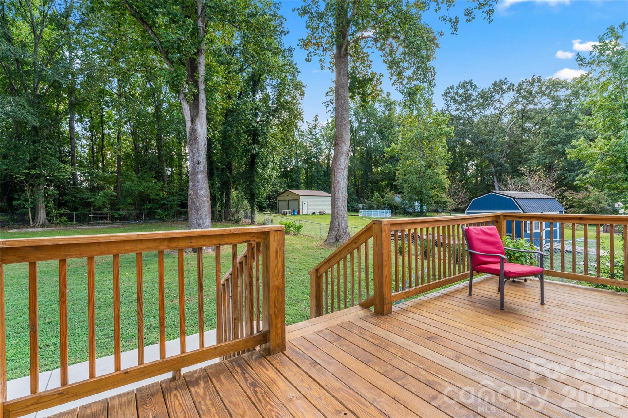 223 Wiley Avenue York, SC 29745 - Photo 31 of 40 a view of a deck with wooden floor and outdoor seating