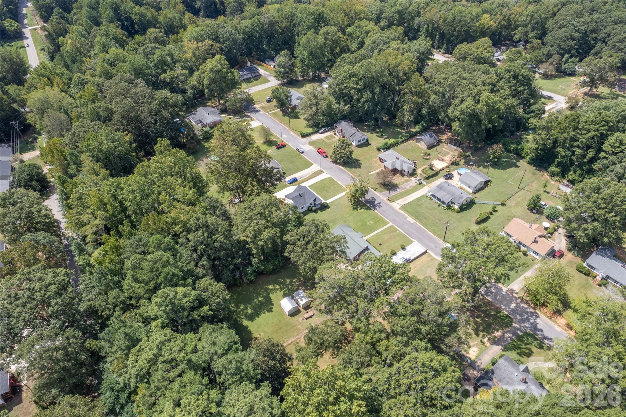223 Wiley Avenue York, SC 29745 - Photo 37 of 40 an aerial view of residential house with outdoor space and trees all around