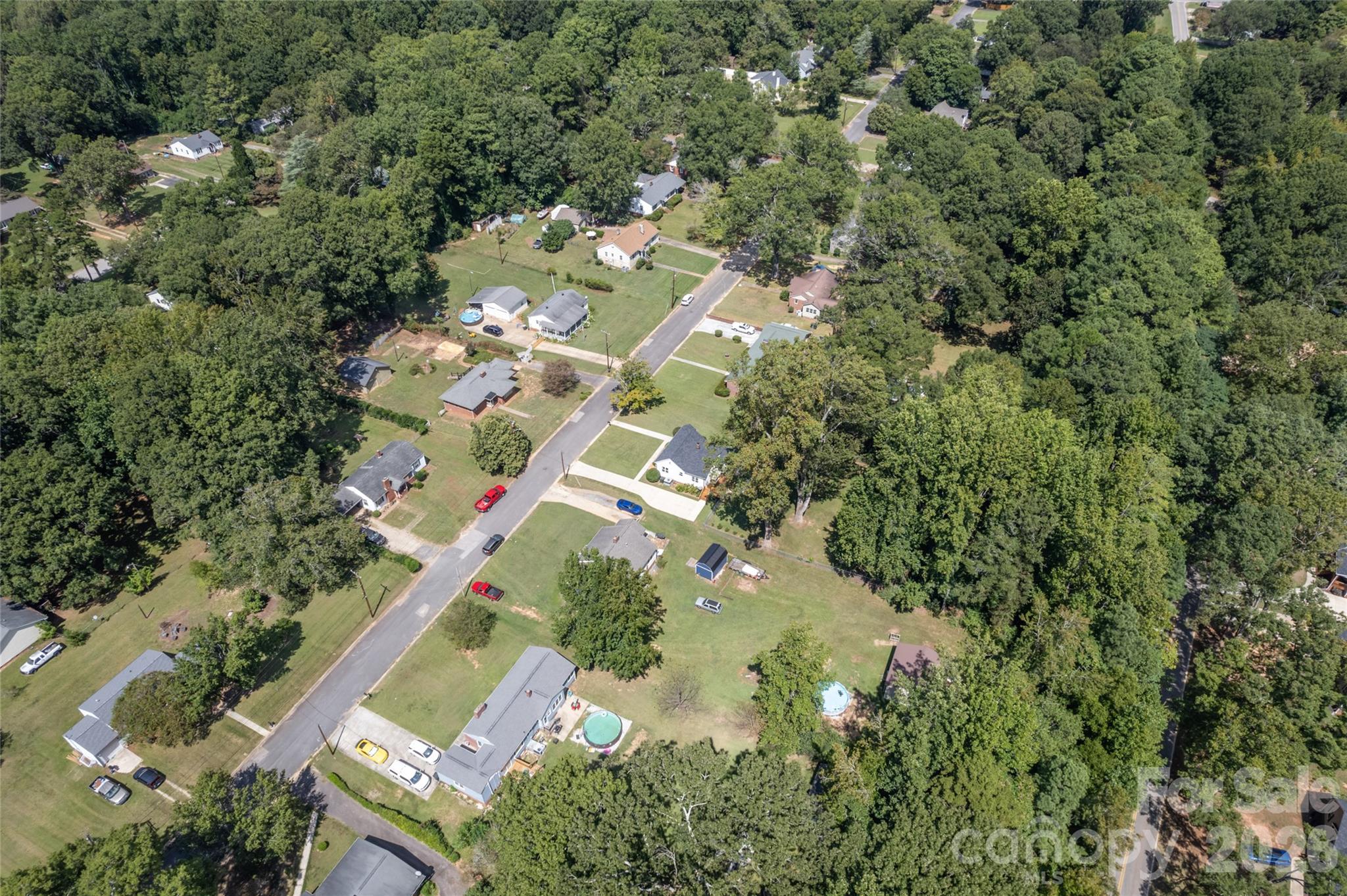 223 Wiley Avenue York, SC 29745 - Photo 38 of 40 an aerial view of residential house with outdoor space and trees all around